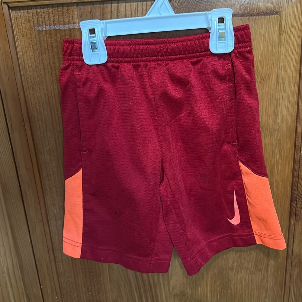 Red and orange Nike shorts